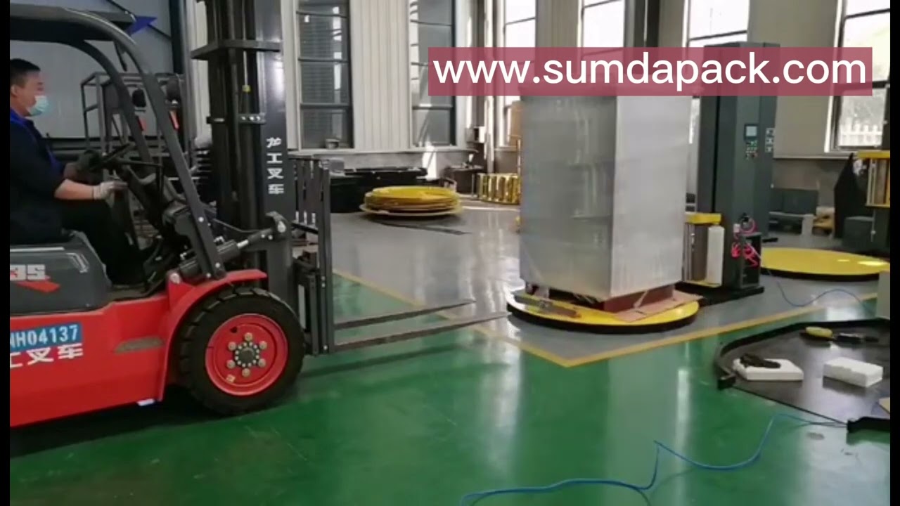 Pallet wrapping machine