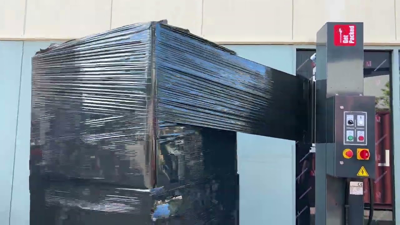 Pallet wrapping machine
