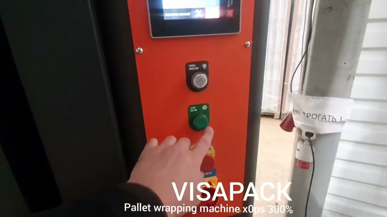 Pallet wrapping machine